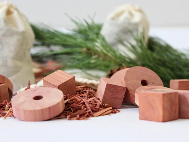 red cedar pieces as mothballs scattered on a table